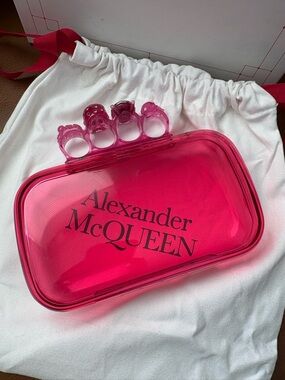 Alexander McQueen Four Ring embellished clutch